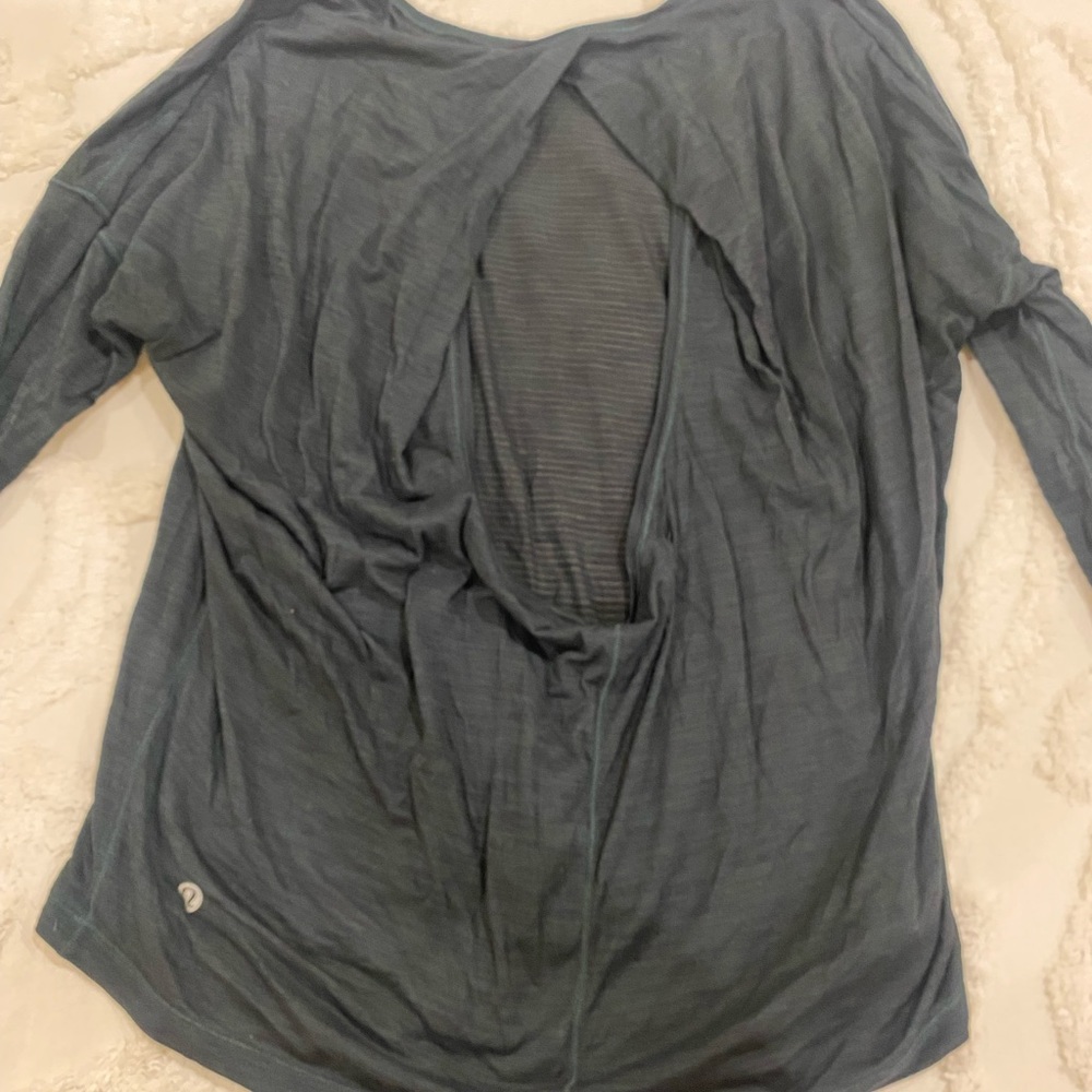 Black Lululemon Long Sleeve Top with cut out in back.